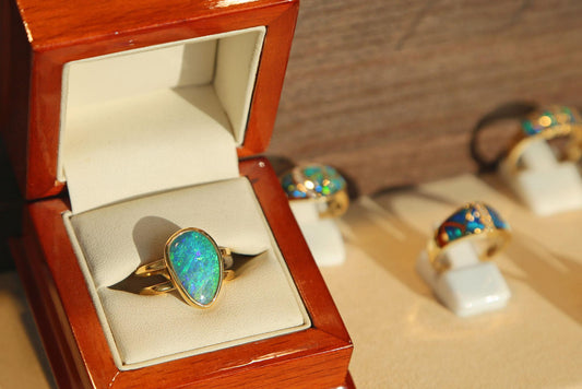 Opal engagement ring with natural opal gemstone and colorful fire for bridal jewelry